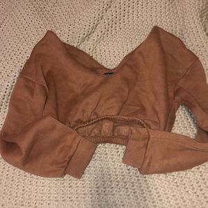 Boohoo rust colored cropped sweatshirt